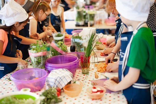 Young Chefs Preparing Fresh Ingredients